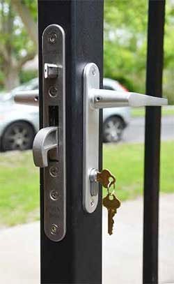 Locinox H Metal lock fitted into a gate frame 