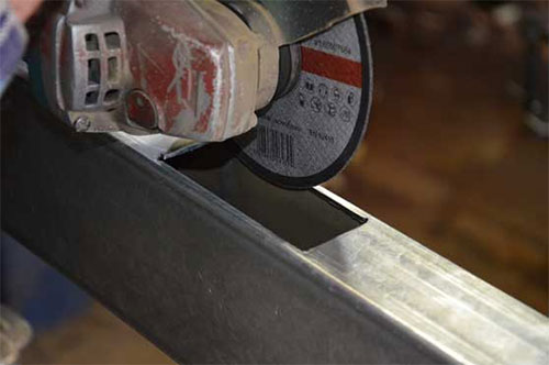 cutting a hole for the sliding gate wheel